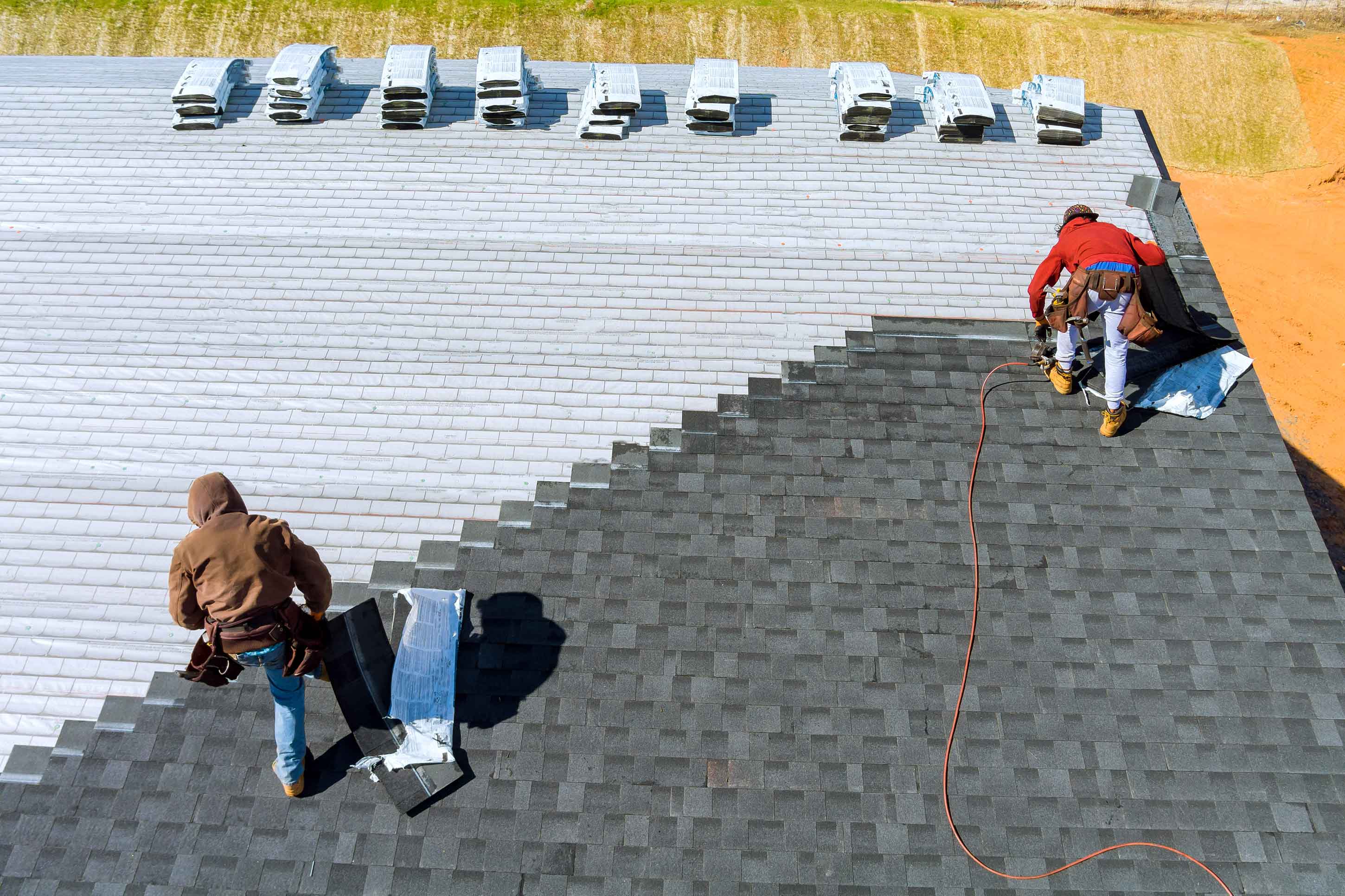 Professional team installing new roof with premium materials
